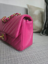 Load image into Gallery viewer, Chanel series 21 2015 Hot Pink Lambskin Chevron Mini Rectangular Flap Bag with Yellow GHW
