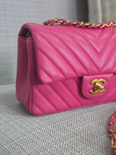 Load image into Gallery viewer, Chanel series 21 2015 Hot Pink Lambskin Chevron Mini Rectangular Flap Bag with Yellow GHW
