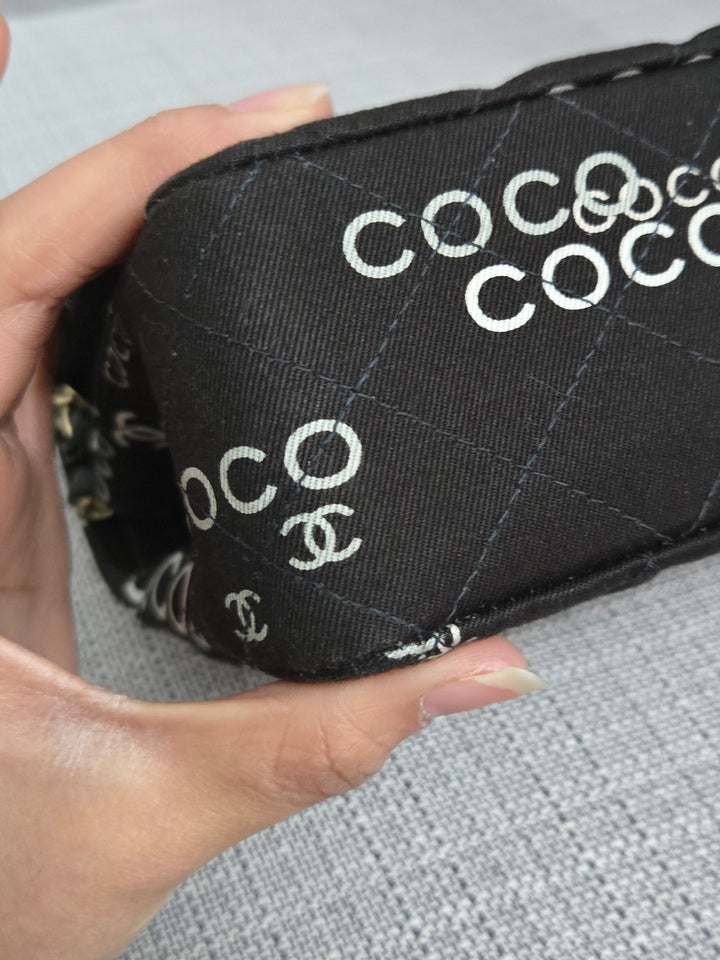 Chanel series 7 2002/2003 Black Canvas Quilted “COCO” Medium Classic Flap Light Gold Hardware
