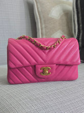 Load image into Gallery viewer, Chanel series 21 2015 Hot Pink Lambskin Chevron Mini Rectangular Flap Bag with Yellow GHW
