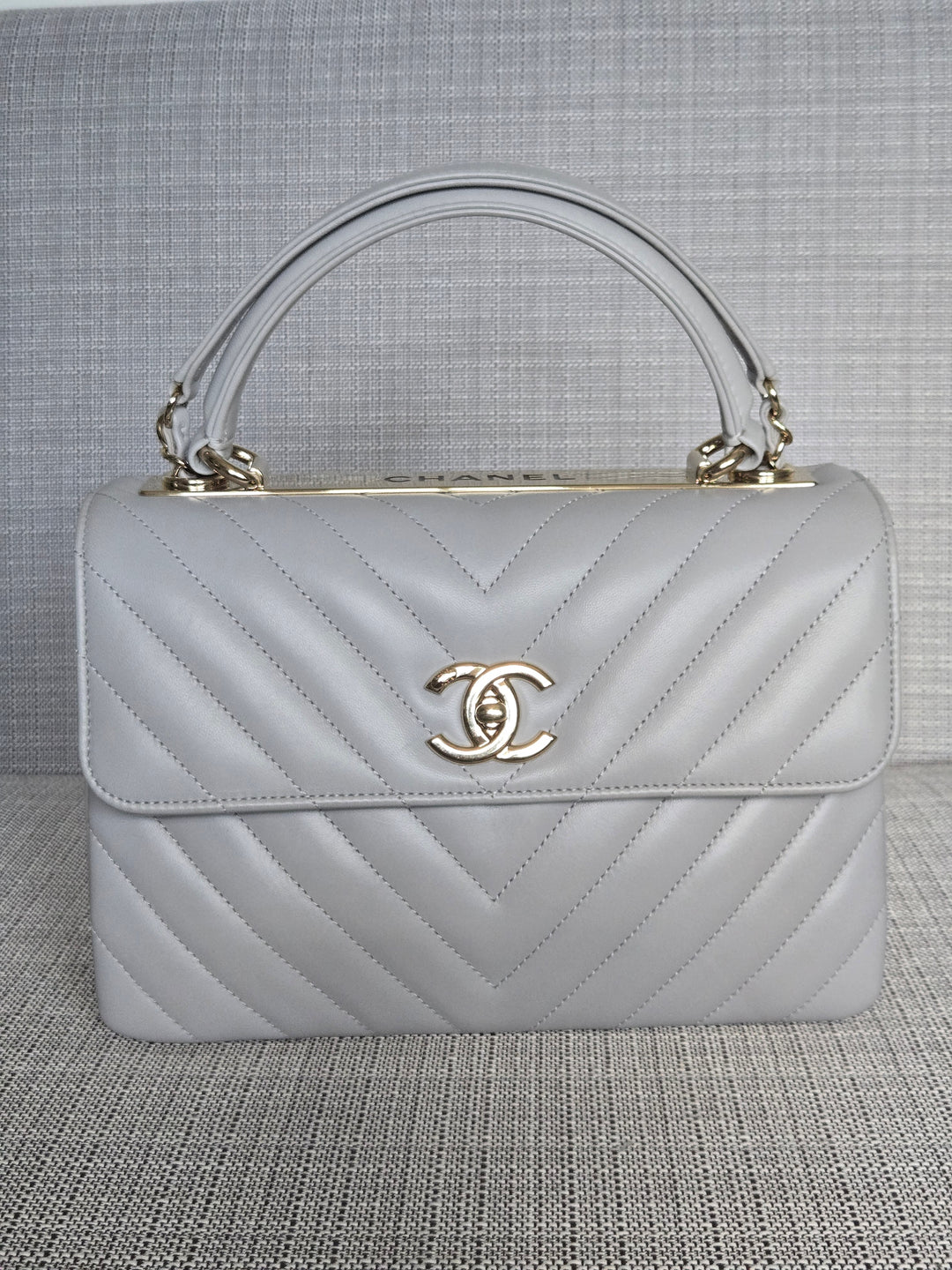 Chanel series 25 Grey Lambskin Chevron Trendy CC Top Handle Flap Bag Size Small with Champagne GHW and Detachable Shoulder strap