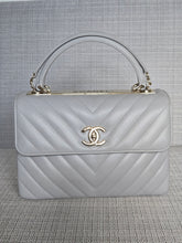 Load image into Gallery viewer, Chanel series 25 Grey Lambskin Chevron Trendy CC Top Handle Flap Bag Size Small with Champagne GHW and Detachable Shoulder strap
