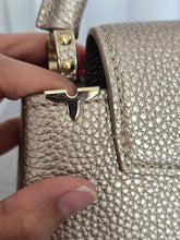 Load image into Gallery viewer, LOUIS VUITTON LV Metallic Taurillon Embellished Flower Crown Mini Capucines in Gold
