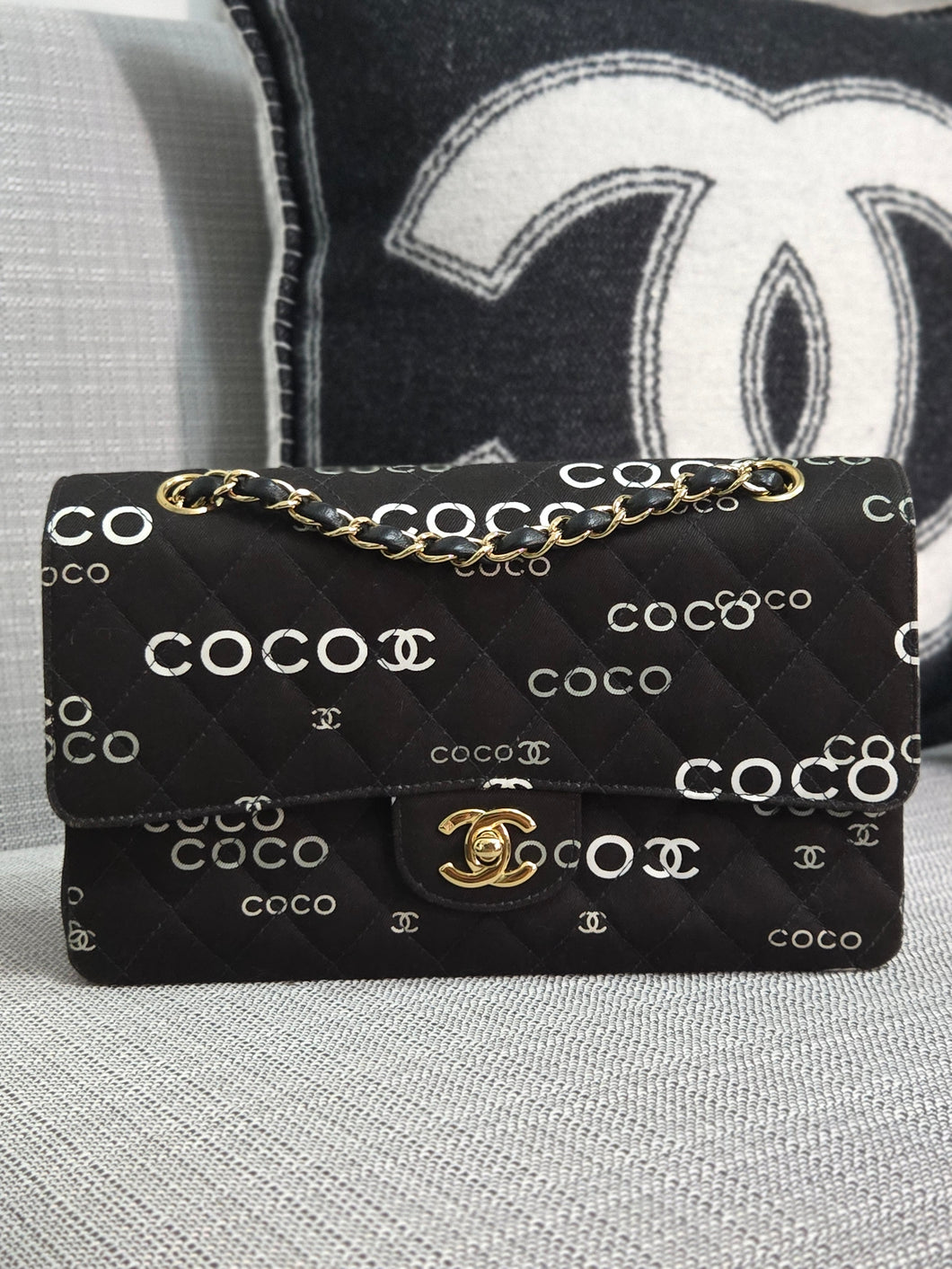 Chanel series 7 2002/2003 Black Canvas Quilted “COCO” Medium Classic Flap Light Gold Hardware