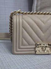 Load image into Gallery viewer, Chanel series 26 18A 2018 Fall/Winter Collection Iridescent Light Beige Chevron Caviar Le Boy Flap Bag size Small with Shiny GHW
