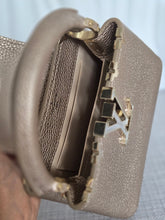 Load image into Gallery viewer, LOUIS VUITTON LV Metallic Taurillon Embellished Flower Crown Mini Capucines in Gold
