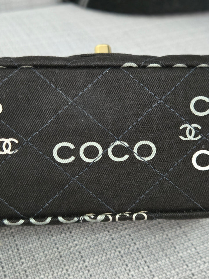 Chanel series 7 2002/2003 Black Canvas Quilted “COCO” Medium Classic Flap Light Gold Hardware