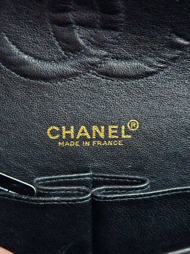 Chanel series 7 2002/2003 Black Canvas Quilted “COCO” Medium Classic Flap Light Gold Hardware