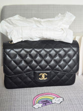 Load image into Gallery viewer, Chanel series 24 Black Caviar GHW Jumbo Timeless Double Flap Bag
