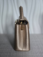 Load image into Gallery viewer, LOUIS VUITTON LV Metallic Taurillon Embellished Flower Crown Mini Capucines in Gold
