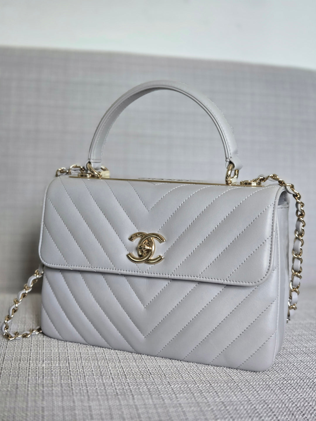 Chanel series 25 Grey Lambskin Chevron Trendy CC Top Handle Flap Bag Size Small with Champagne GHW and Detachable Shoulder strap