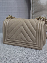 Load image into Gallery viewer, Chanel series 26 18A 2018 Fall/Winter Collection Iridescent Light Beige Chevron Caviar Le Boy Flap Bag size Small with Shiny GHW
