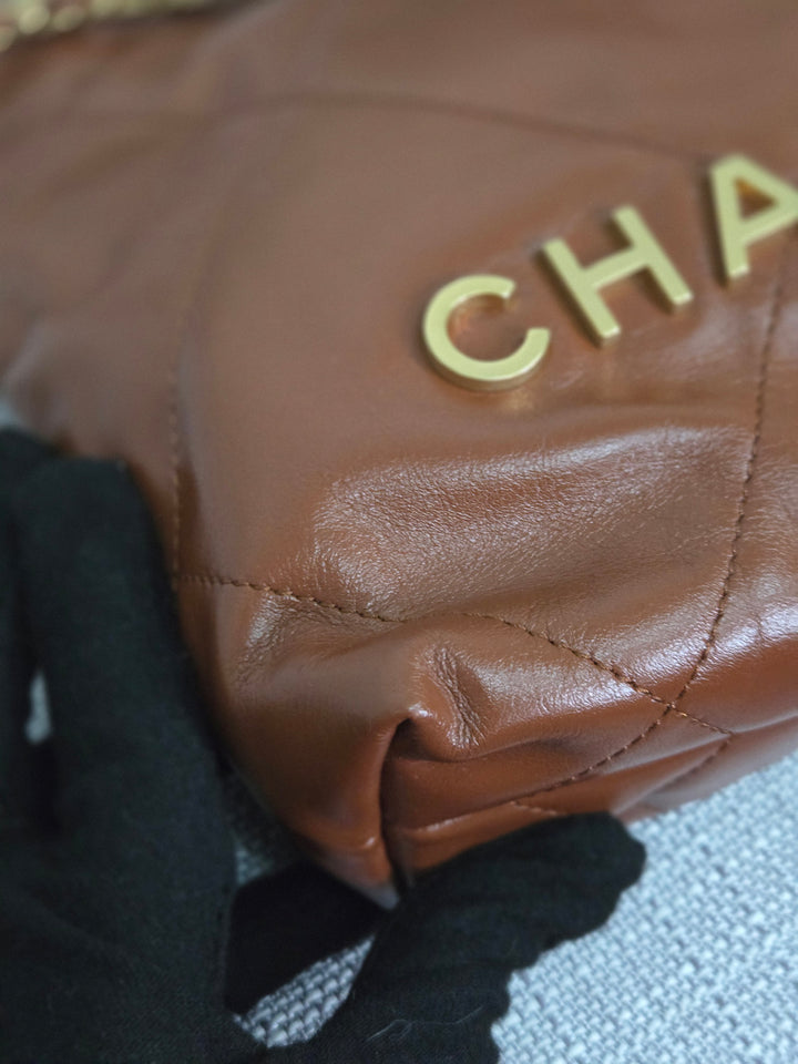 Chanel 23A 2023 Fall/Winter Collection Brown Lambskin Mini 22 Bag