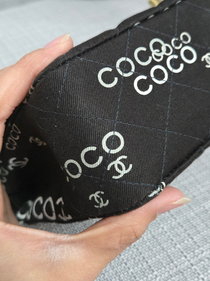Chanel series 7 2002/2003 Black Canvas Quilted “COCO” Medium Classic Flap Light Gold Hardware