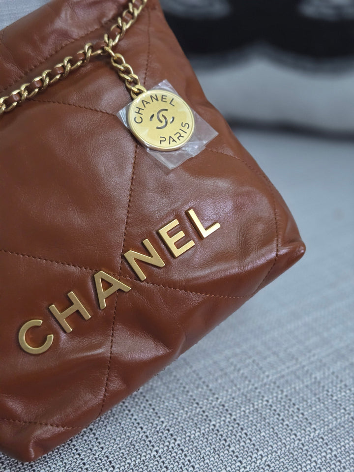 Chanel 23A 2023 Fall/Winter Collection Brown Lambskin Mini 22 Bag