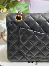 Load image into Gallery viewer, Chanel series 1 (circa 1989-1991) Black Lambskin 24K GHW Small Classic Double Flap Vintage Bag
