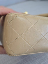 Load image into Gallery viewer, Chanel series 1 Beige Lambskin 24K GHW Vintage Mini Flap Bag
