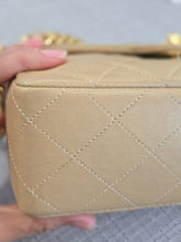 Load image into Gallery viewer, Chanel series 1 Beige Lambskin 24K GHW Vintage Mini Flap Bag
