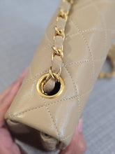 Load image into Gallery viewer, Chanel series 1 Beige Lambskin 24K GHW Vintage Mini Flap Bag
